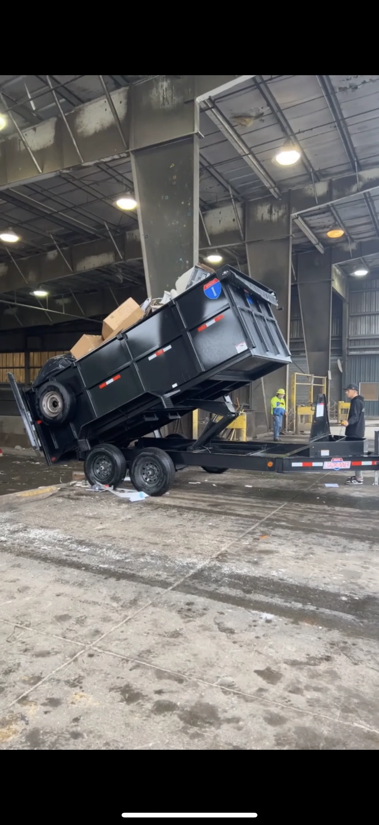 Top Tier trailer tipping debris at a disposal facility