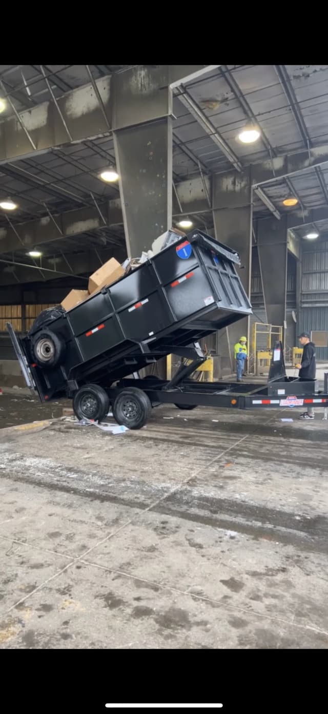 Top Tier trailer tipping debris at a disposal facility