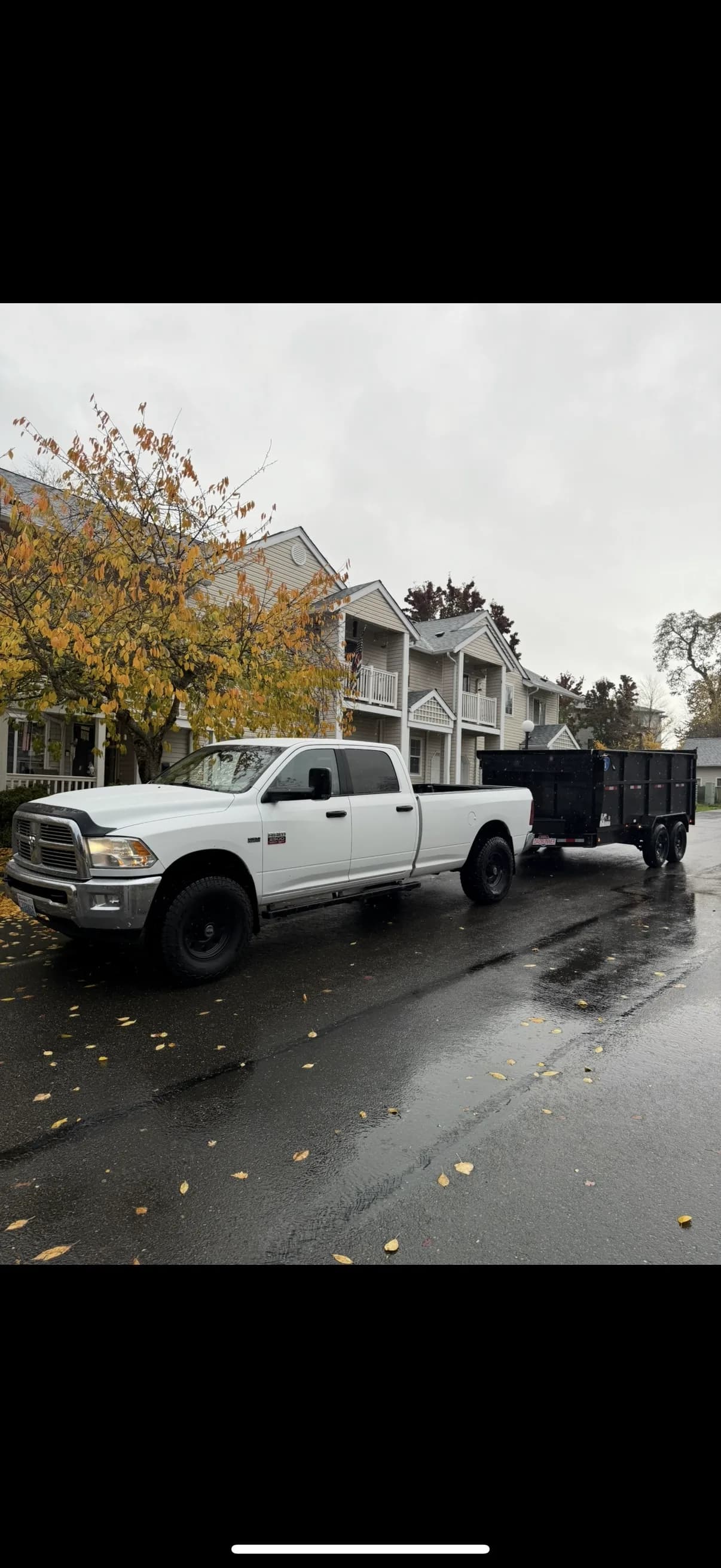 Top Tier truck and trailer ready for a neighborhood job